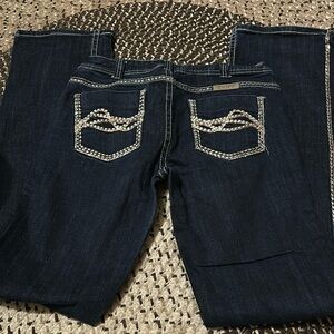 Women’s cowgirl, tough Company jeans